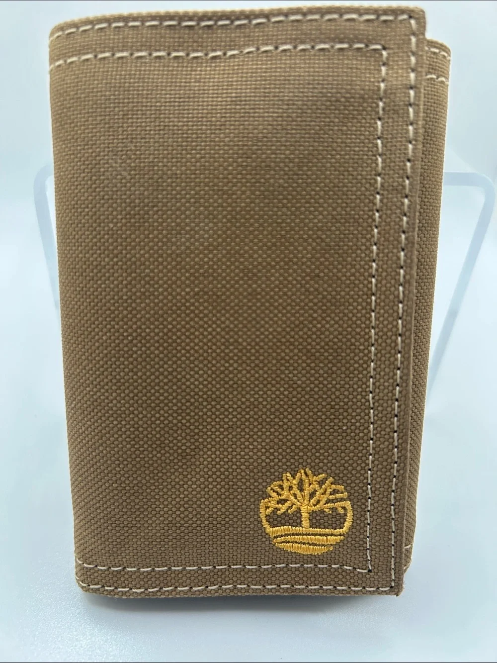 Canvas wallet. Open its 9.5. 4.5 H trifold